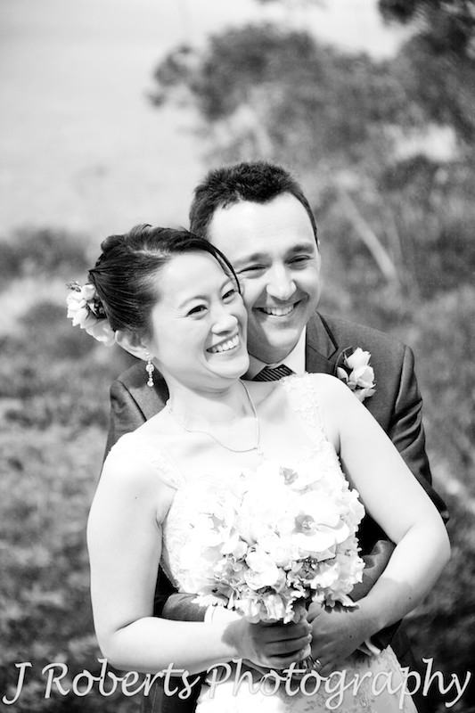 B&W bride and groom smiling - wedding photography sydney